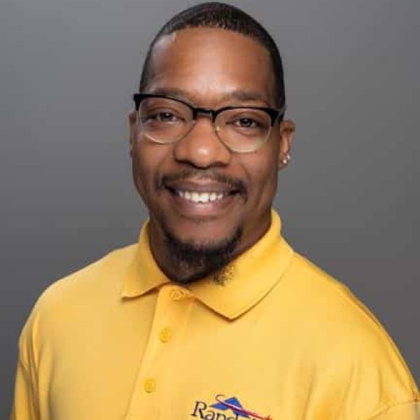 A person wearing a Yellow shirt. Randolph Riverfront Center team